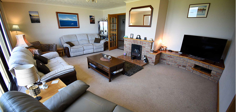 Gairloch View Bed and Breakfast contains a living room with TV and WIFI internet